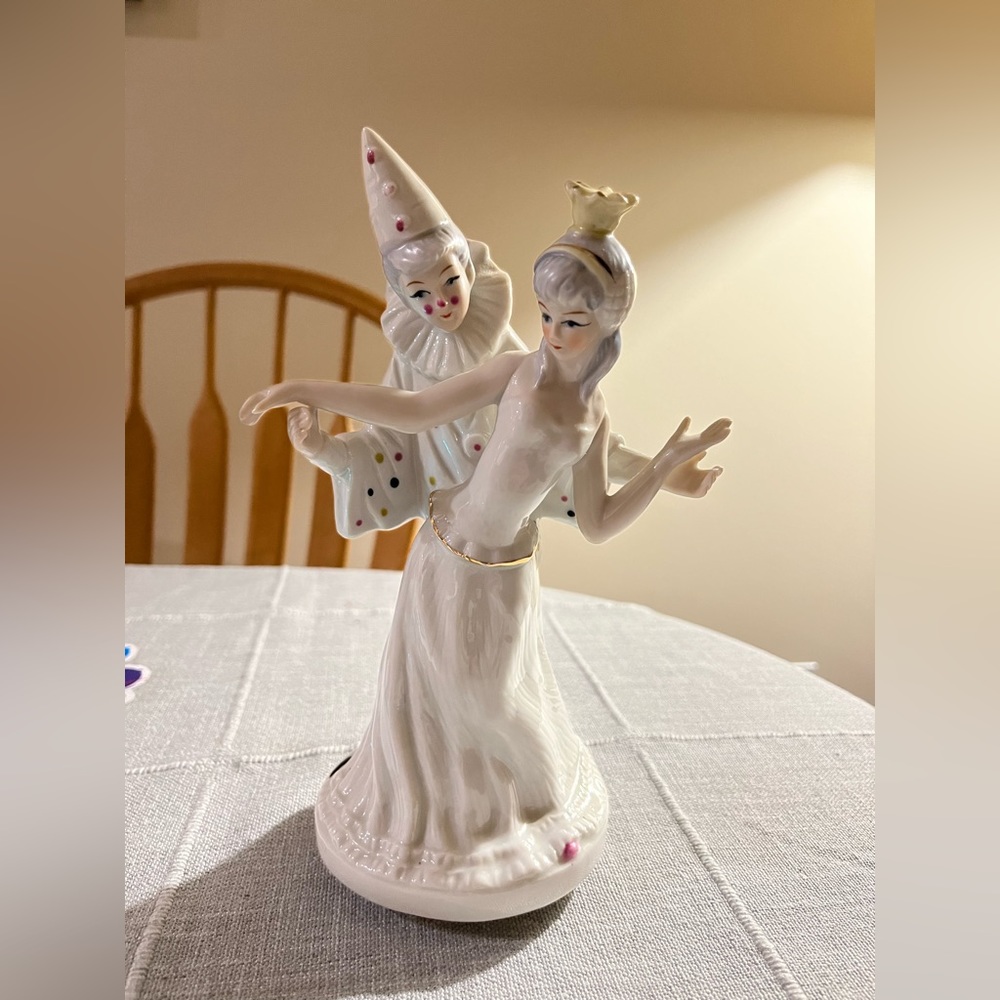 Vintage porcelain dancing clown and princess